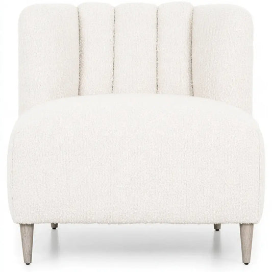 White armless lounge chair with a segmented backrest by CraftandCrux, showcasing a modern, minimalist design.