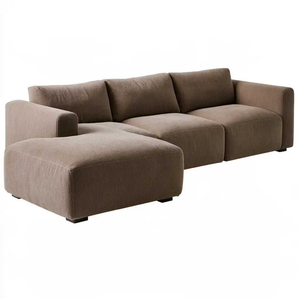Craftandcrux brown sofa with elongated seat and straight arms, showcasing a modern and comfortable living room piece.